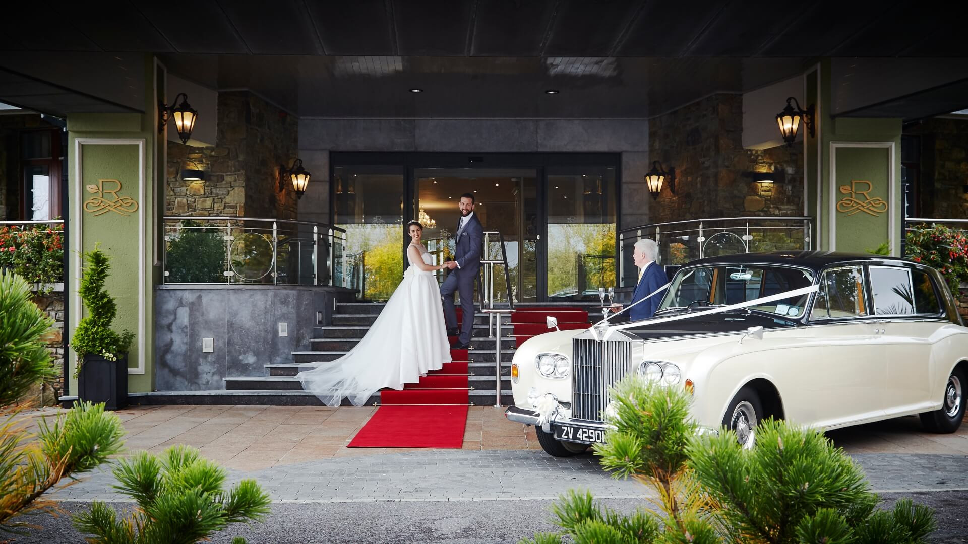 Wedding couple exterior rolls royce banner www.therosehotel.com_v3