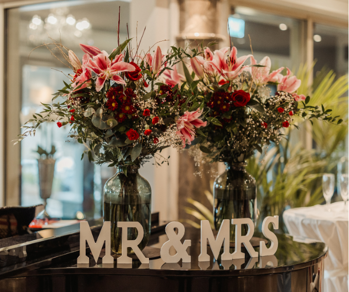 Mr and Mrs sign in lobby for wedding