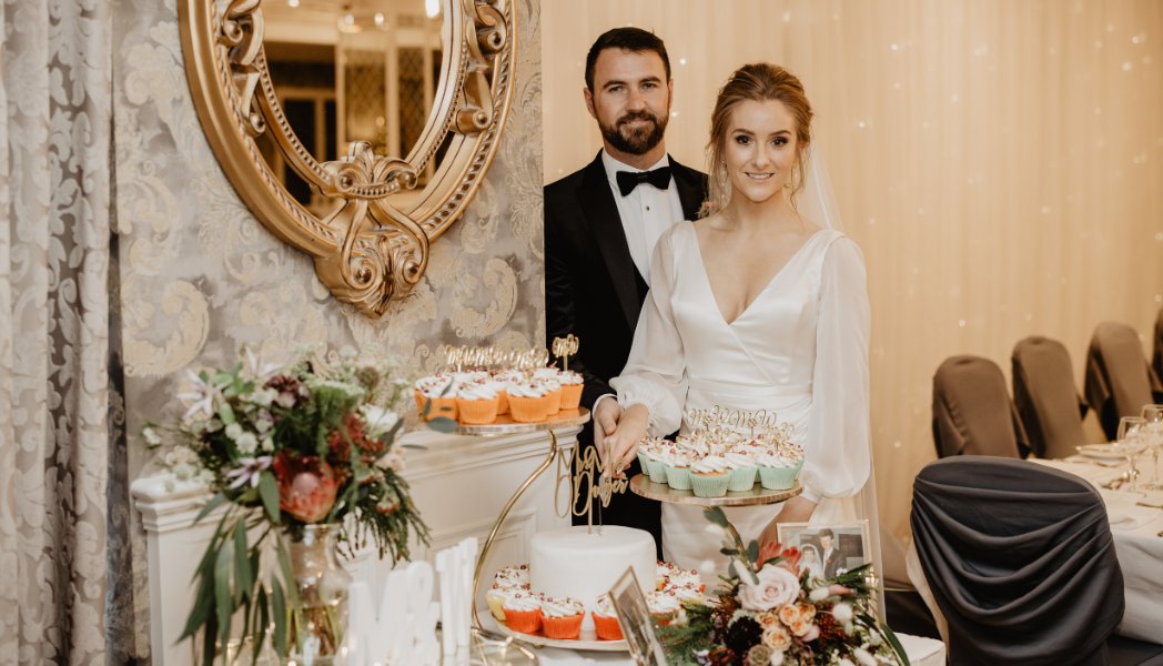 Wedding Couple cutting their Cake