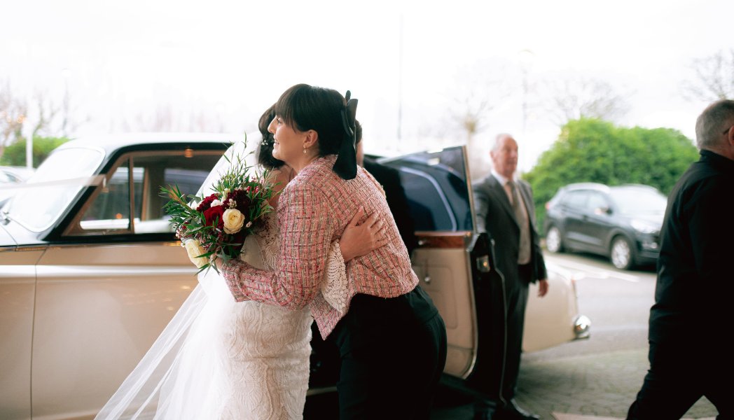 Bride hugging our Wedding Coordinator Jennifer